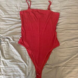 Charlotte Russe red ribbed body suit size medium, only worn twice!